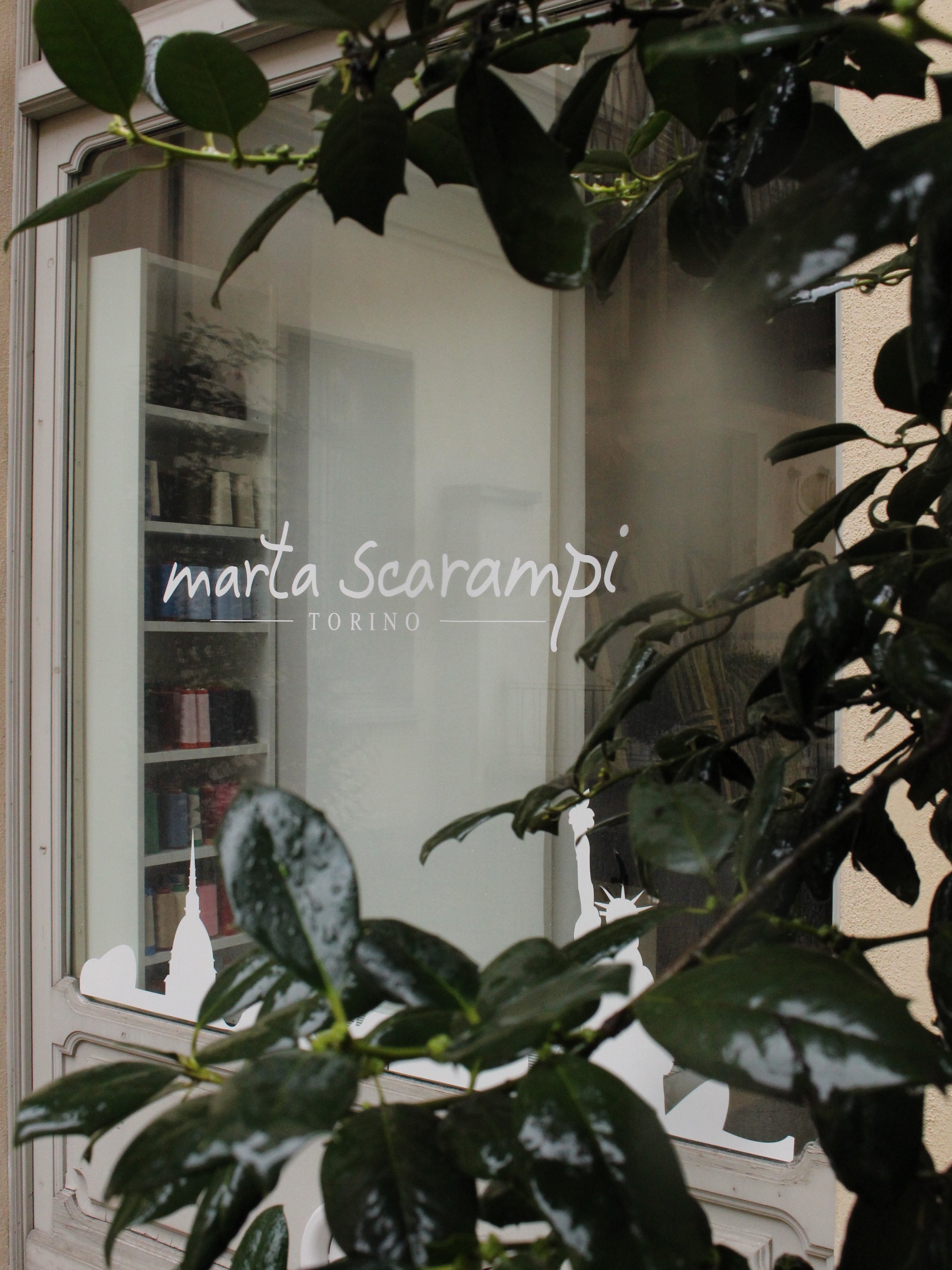 A detail of the window of the Marta Scarampi atelier. 