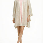 Alma Poncho in beige net, front view