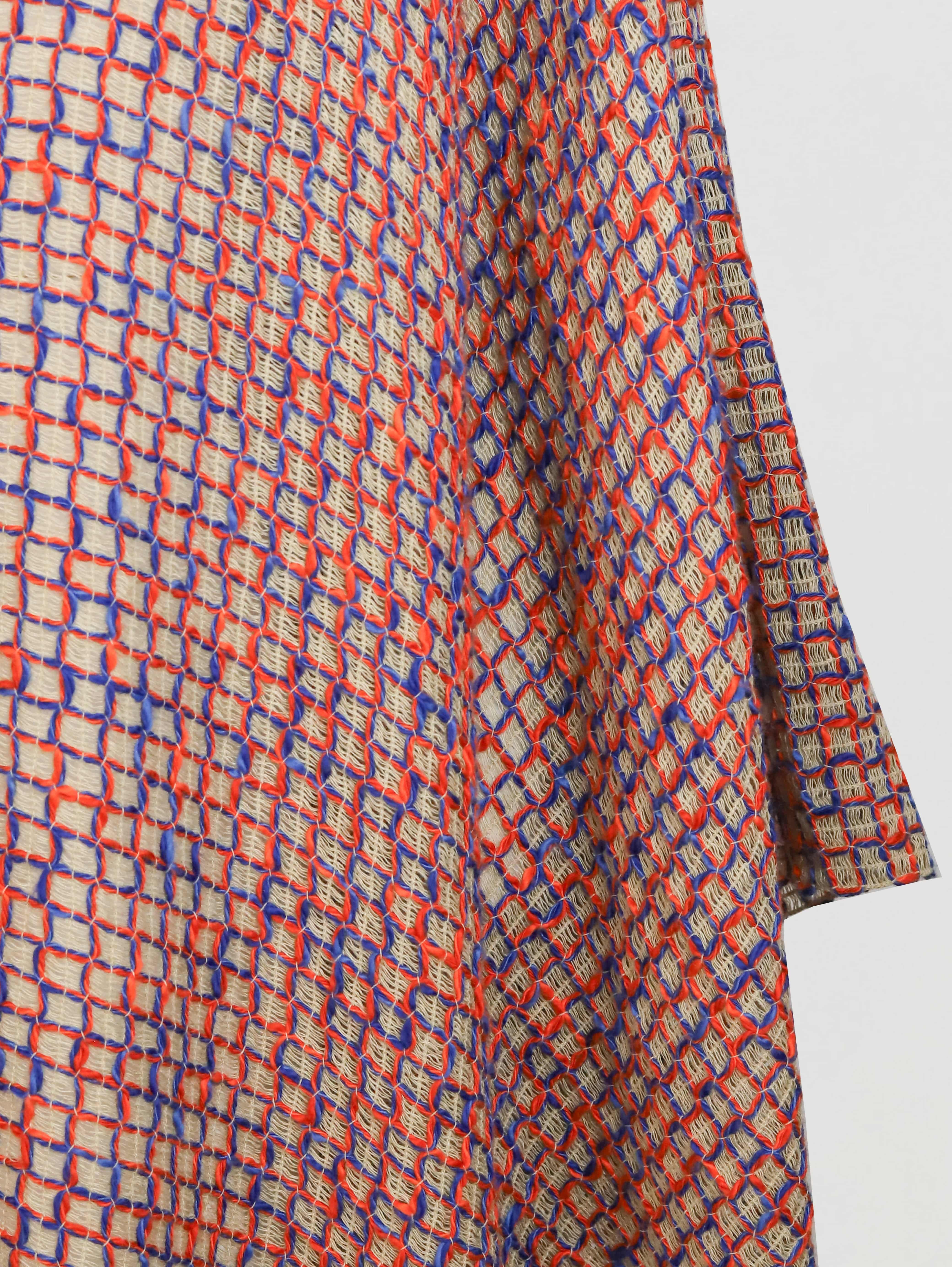 Alma Poncho in orange and blue, detail
