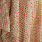 Alma Poncho in pink and yellow, detail