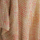 Alma Poncho in pink and yellow, detail