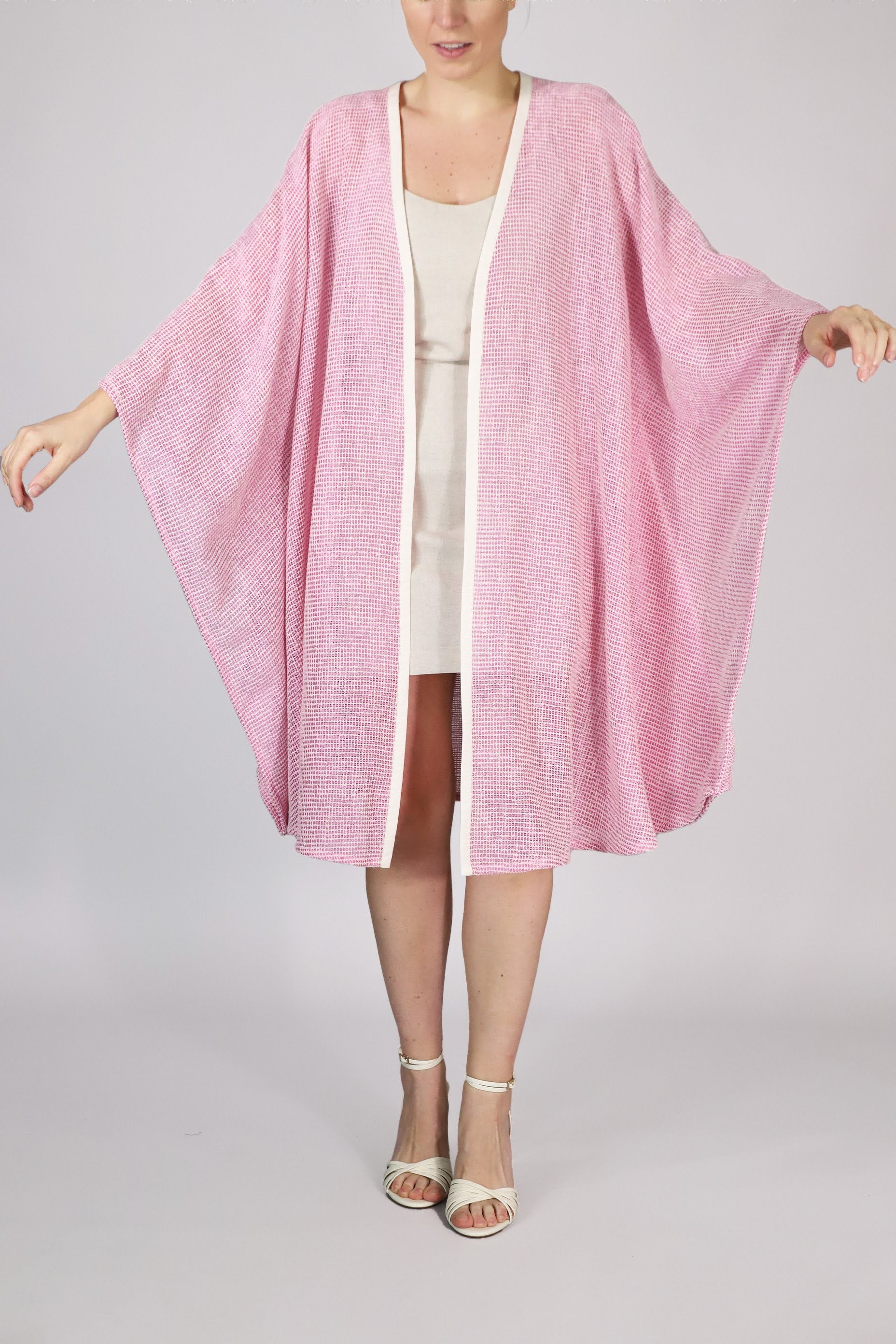 Alma Poncho in pink net, front view