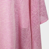 Alma Poncho in pink net, close-up of the weave