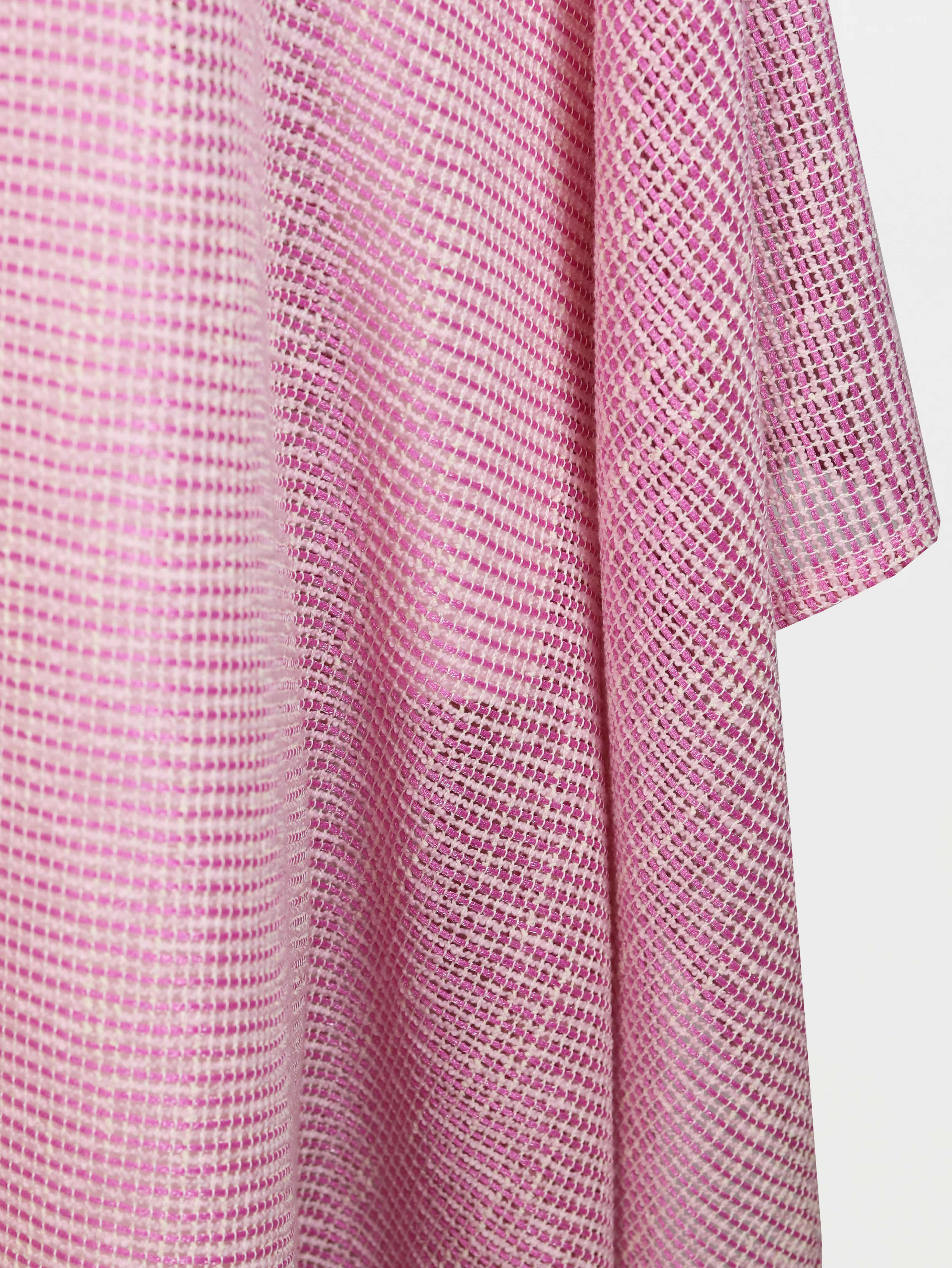 Alma Poncho in pink net, close-up of the weave