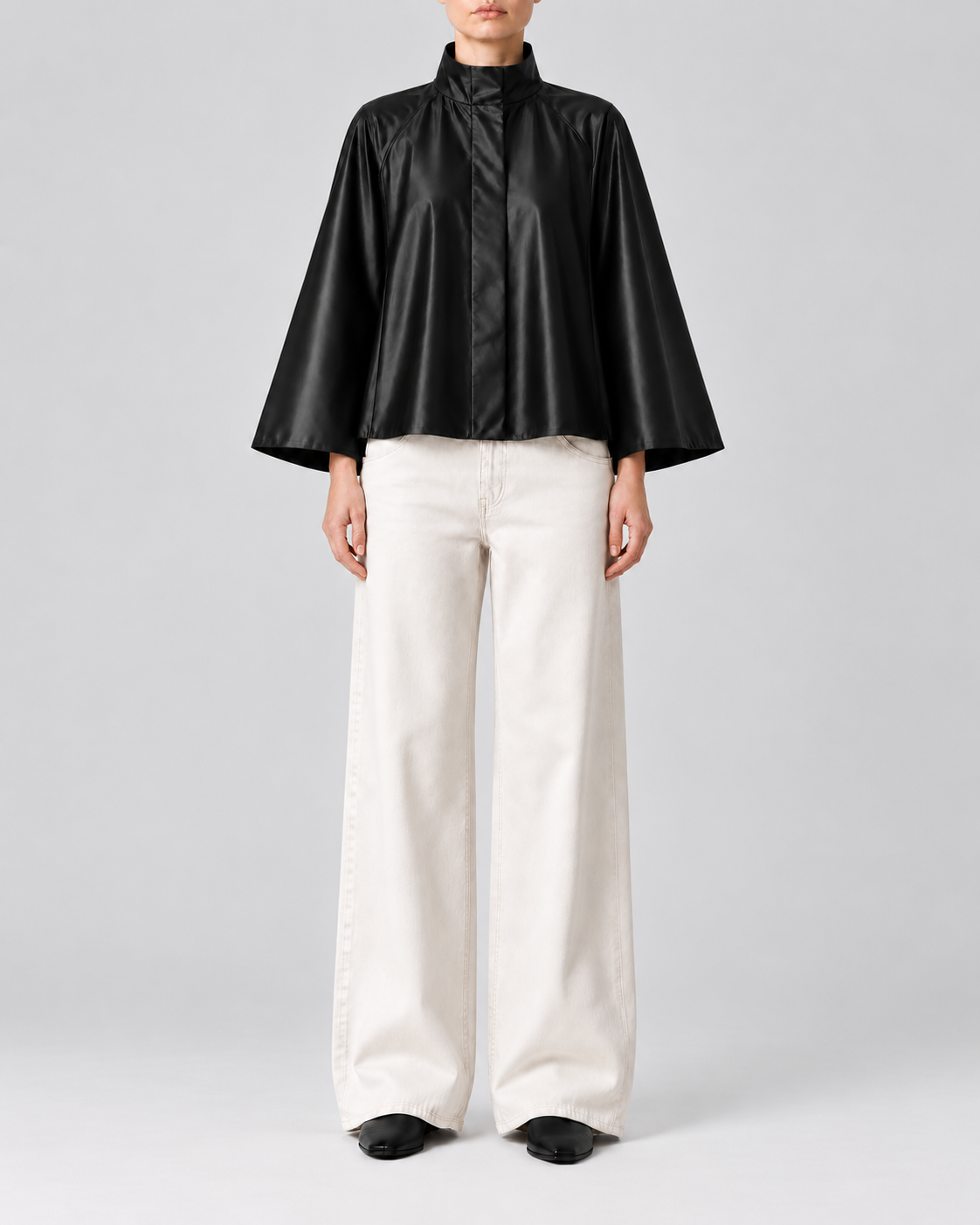 Audrey Water-Resistant Cape in black, front view