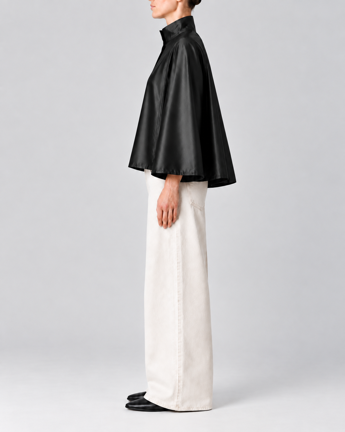 Audrey Water-Resistant Cape in black, side view