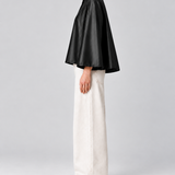 Audrey Water-Resistant Cape in black, side view