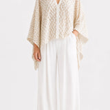 Aura Poncho in beige net, front view
